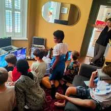 Children playing console games together